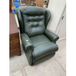 A SHERBORNE GREEN LEATHER ARMCHAIR