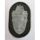 A DEMJANSK SHIELD BADGE