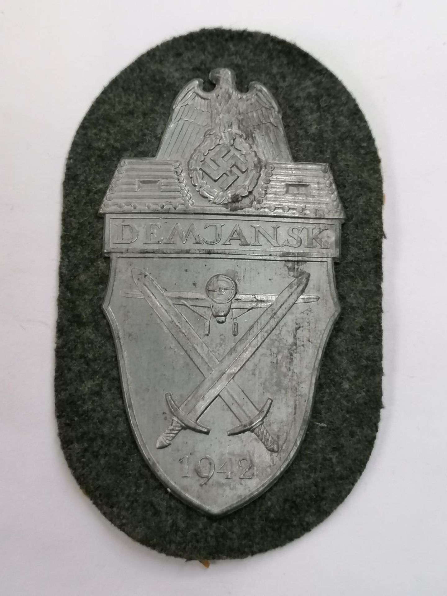 A DEMJANSK SHIELD BADGE