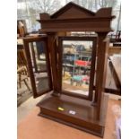 A MAHOGANY THREE SECTION DRESSING TABLE MIRROR