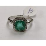 A 9CT WHITE GOLD DIAMOND AND EMERALD RING, EMERALD 1.51 CARATS, WEIGHT 2.9 GRAMS, INSURANCE VALUE £