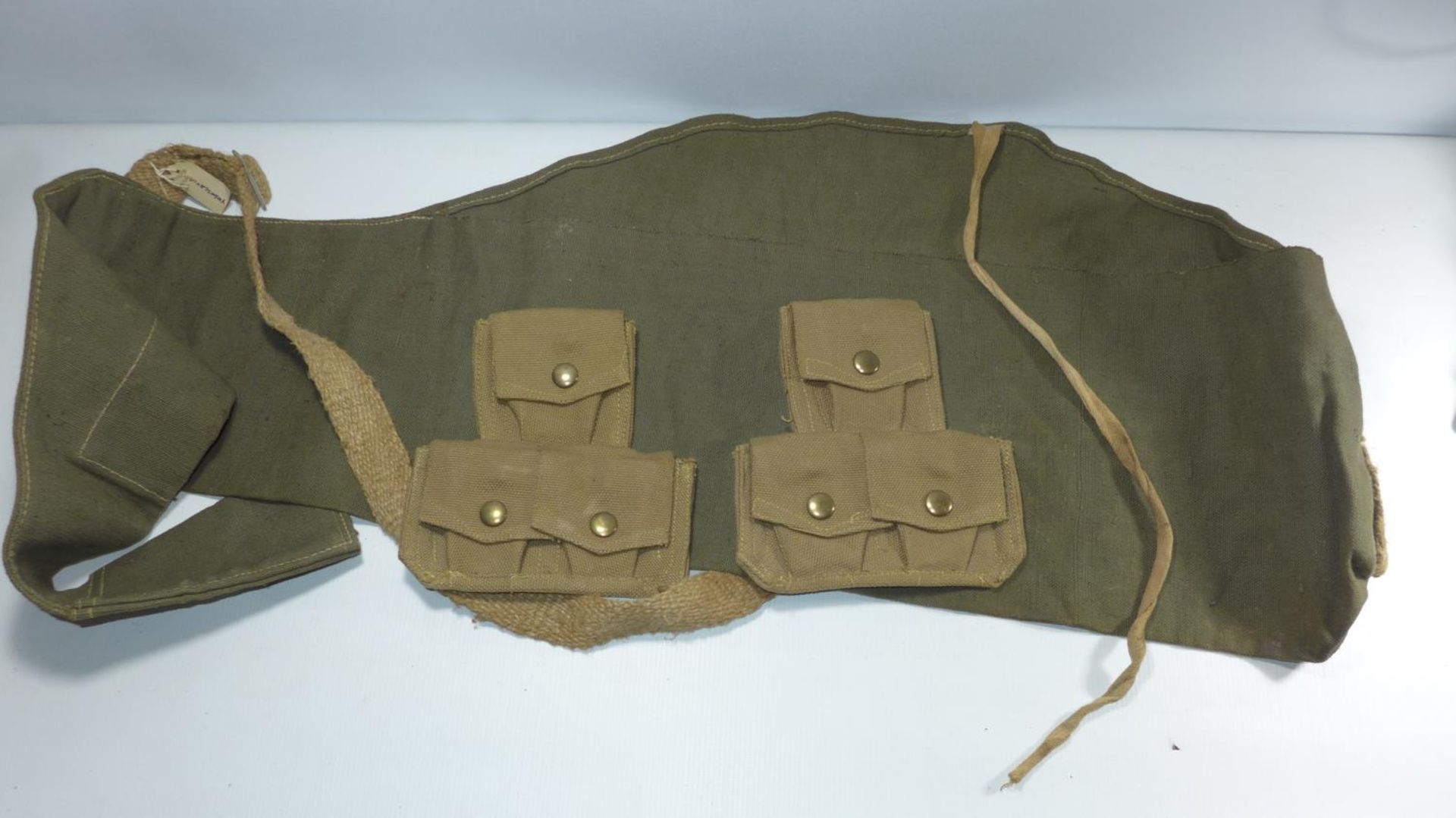 A YUGOLSAVIAN GREEN CANVAS GUN SLIP AND 2 X WEBBING 3 POUCH AMMO POUCHES