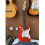 A FENDER SQUIRE STRAT RED ELECTRIC GUITAR