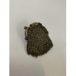 A WHITE METAL MINIATURE COIN PURSE