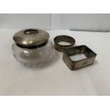 A HALLMARKED SILVER LIDDED POT AND TWO NAPKIN RINGS