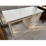 A WHITE PAINTED DESK WITH ONE DOOR AND ONE DRAWER