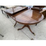 AN EXTENDING MAHOGANY DINING TABLE