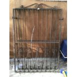 A LARGE PAIR OF WROUGHT IRON ORNATE GATES (EACH GATE 111CM X 164CM HIGH)