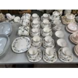 A COLCLOUGH TEA SET COMPRISING OF CUPS, SAUCERS, SIDE PLATES, CREAM JUGS ETC