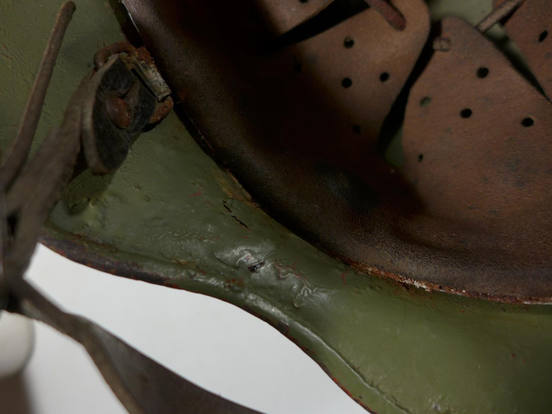 A GERMAN RUSTED AND GREEN PAINTED HELMET - Image 4 of 4