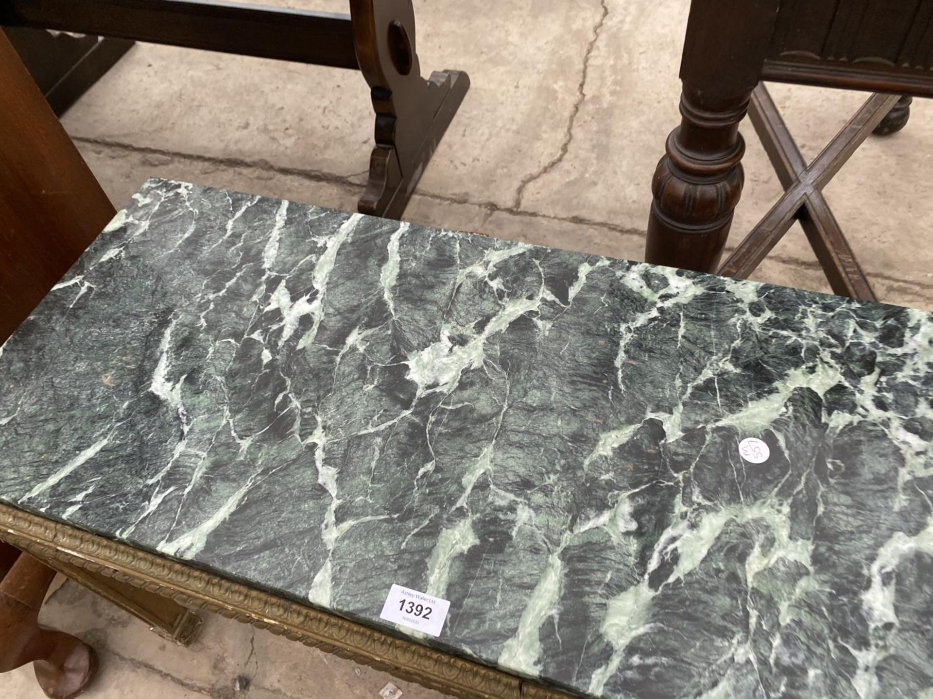 A MARBLE AND GILDED COFFEE TABLE - Image 2 of 2