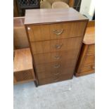 A TEAK CHEST OF SIX DRAWERS