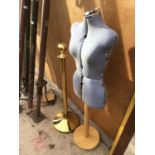 A TAILORS DUMMY AND A BRASS EFFECT DISPLAY STAND