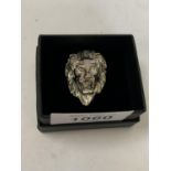 A WHITE METAL LION GENTS RING