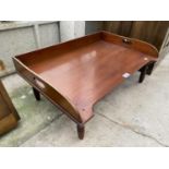 A MAHOGANY BED TRAY TABLE