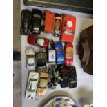 A COLLECTION OF ASSORTED TIN PLATE CAR MODELS