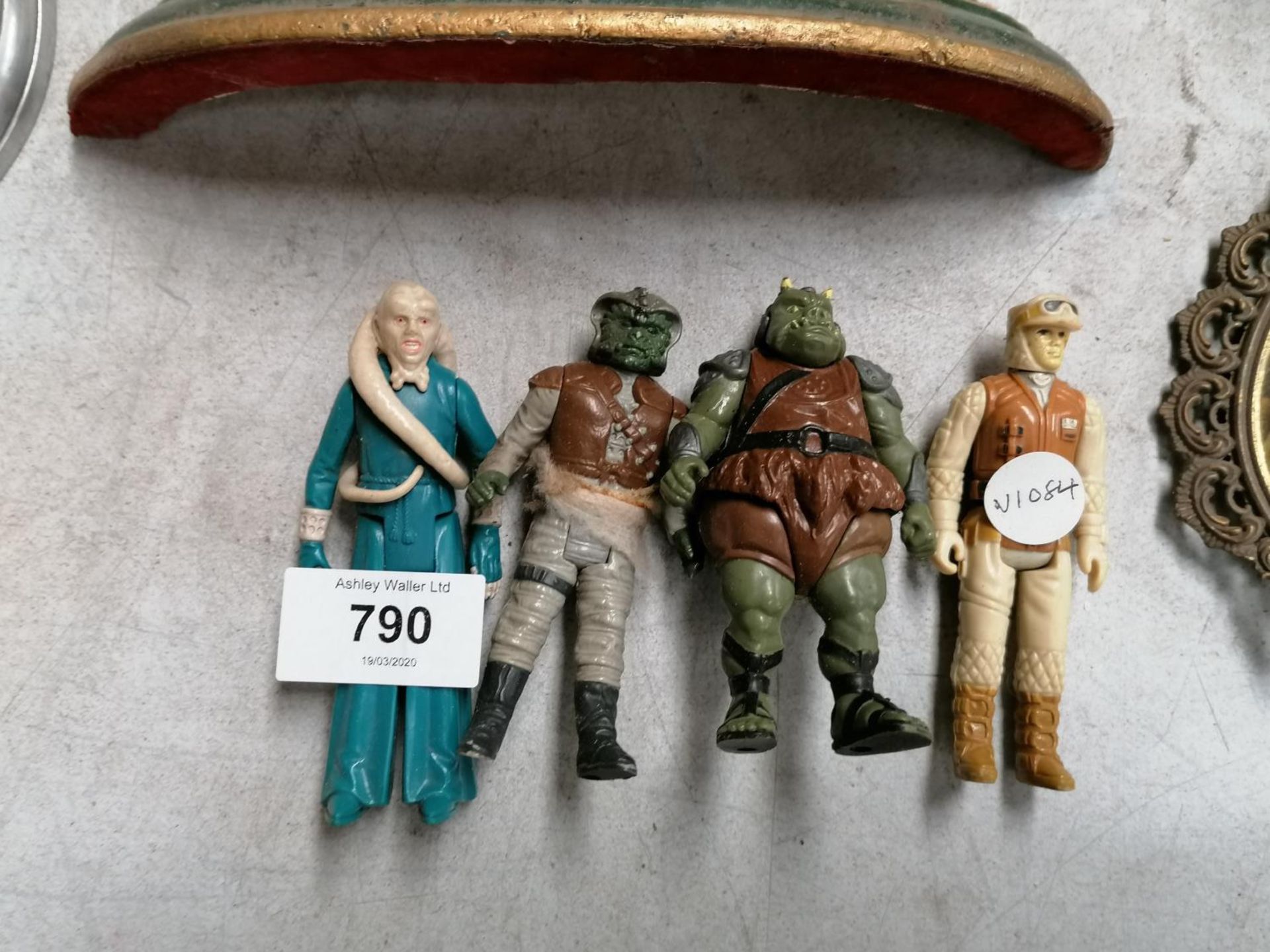 A GROUP OF FOUR STAR WARS FIGURES