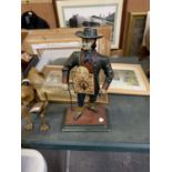 A CAST FIGURAL CLOCK