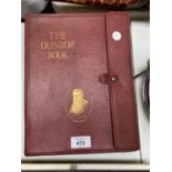 A 'THE DUNLOP BOOK' IN LEATHER EFFECT BINDING