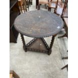 A TRIANGULAR OAK DROP LEAF OCCASIONAL TABLE ON BARLEY TWIST SUPPORTS WITH HEAVILY CARVED TOP, PIE