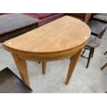 A BEECH DEMI LUNE FOLDING TABLE