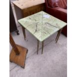 AN ONYX EFFECT SET OF FOUR TRIANGULAR OCCASIONAL TABLES