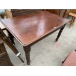 A RECTANGULAR MAHOGANY DINING TABLE