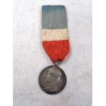 A FRENCH SILVER 1936 MEDAL