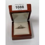 A LADIES EMERALD CUT 1.01 CARAT DIAMOND SINGLE STONE RING SET IN PLATINUM SHANK, UK HALLMARKED,