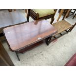 A MAHOGANY COFFEE TABLE AND A DUET STOOL WITH WOVEN SEAT