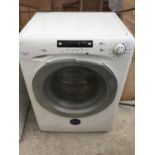 A CANDY GRAND EVO WASHING MACHINE IN WORKING ORDER