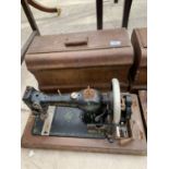 VINTAGE JONES SEWING MACHINE IN A WOODEN CASE