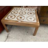 A TILE TOP TEAK COFFEE TABLE