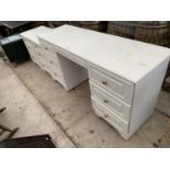 A WHITE DRESSING TABLE AND TWO BEDSIDE CHESTS OF DRAWERS