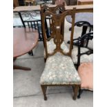 TWO CARVED OAK DINING CHAIRS