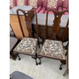 TWO HIGH BACKED MAHOGANY DINING CHAIRS