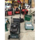 A HAYTER HARRIER PETROL MOWER AND A SYSTEM 300 ELECTRIC MOWER IN WORKING ORDER