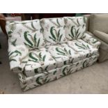 A THREE SEATER SOFA - AS NEW