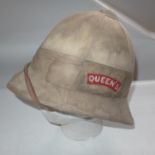 A QUEENS REGIMENT PITH HELMET