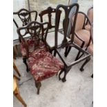 TWO CARVED MAHOGANY DINING CHAIRS AND TWO FURTHER MAHOGANY DINING CHAIRS