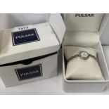 A LADIES BOXED PULSAR WRIST WATCH