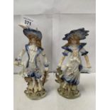 A PAIR OF CERAMIC LADY AND GENT FIGURINES