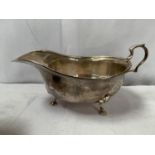 A BIRMINGHAM HALLMARKED SILVER GRAVY BOAT, 102.8 GRAMS