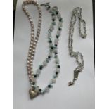 THREE BEAD NECKLACES ONE PEARLISED WITH SILVER METAL HEART PENDANT, WHITE AND TURQUOISE BEADS WITH