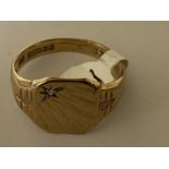 A 9 CARAT YELLOW GOLD CYGNET RING - WEIGHT 4.6 GRAMS