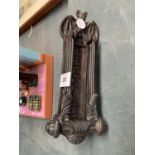 A VICTORIAN ORNATE CAST LETTERBOX AND KNOCKER WITH BAT DETAIL