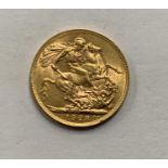 A 1928 GEORGE V GOLD SOVEREIGN