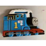 A THOMAS THE TANK ENGINE STORAGE BOX WITH ELEVEN VARIOUS ENGINES (SOME DIECAST) AND A FAT CONTROLLER