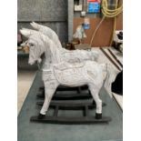 A PAIR OF WHITE WOODEN ROCKING HORSES ON BLACK ROCKERS (BOTH A/F - SEE PHOTOGRAPHS)