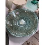 A LARGE TURQUOISE GLASS BOWL